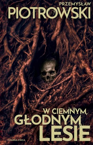 okładka książki, pt. "W ciemnym, głodnym lesie".